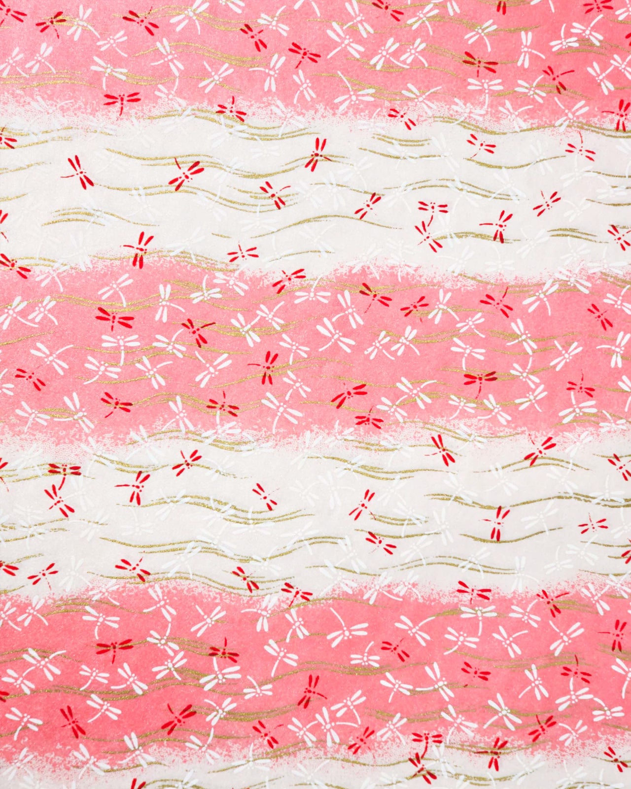 Japanese chiyogami paper featuring pink and white dragonflies on a pearlescent pink and white striped background with metallic gold wavy lines.