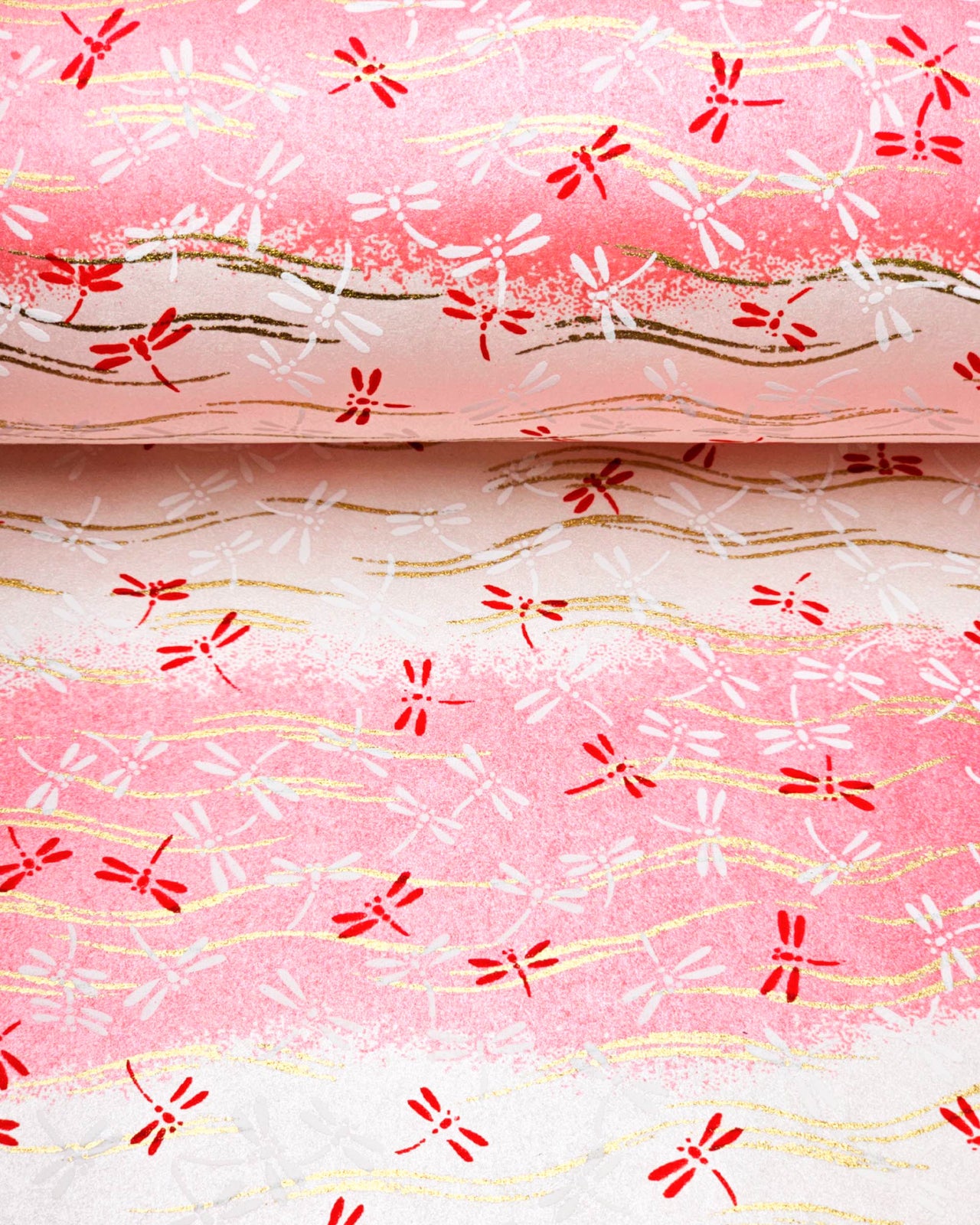 Japanese chiyogami paper featuring pink and white dragonflies on a pearlescent pink and white striped background with metallic gold wavy lines.