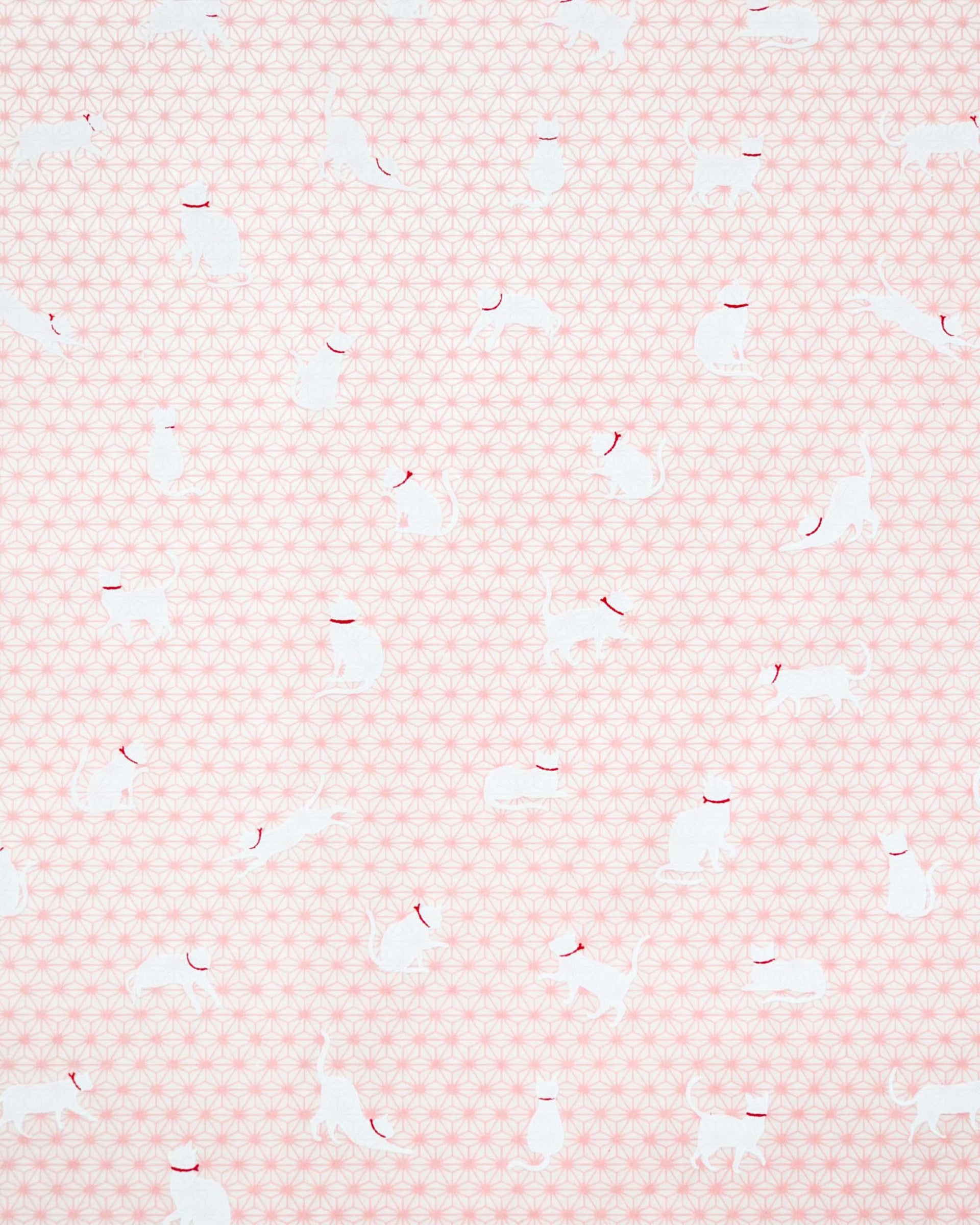 Japanese chiyogami paper featuring assorted white cats with red collars on a light pink asanoha (hemp leaf) background.