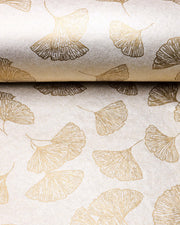Japanese chiyogami paper featuring large metallic gold gingko leaves on a light shimmering gold background.