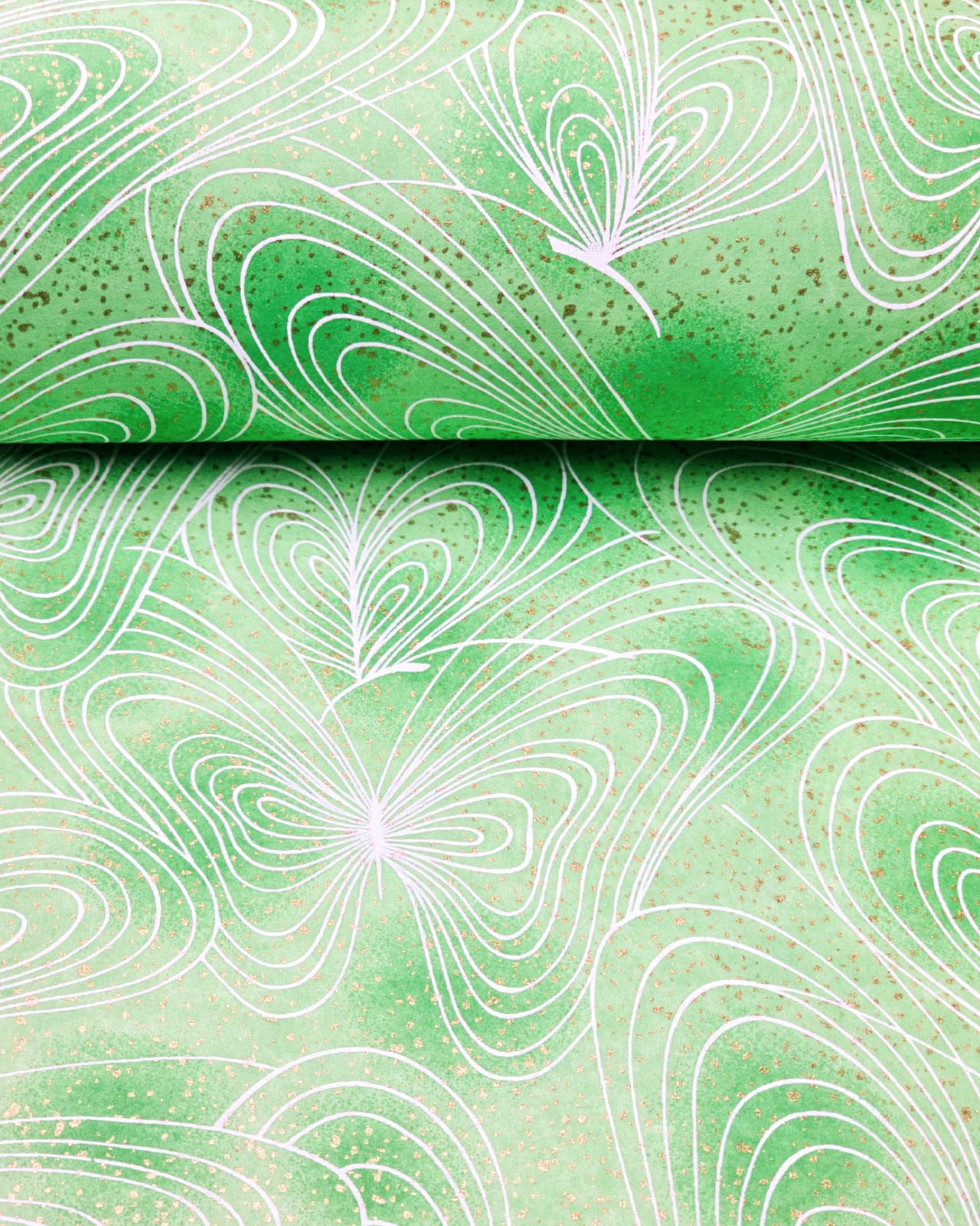 Japanese chiyogami paper featuring white butterfly outlines on a green background with metallic gold details.