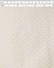 Japanese chiyogami paper featuring a traditional white and metallic gold seigaiha (wave crests) pattern.