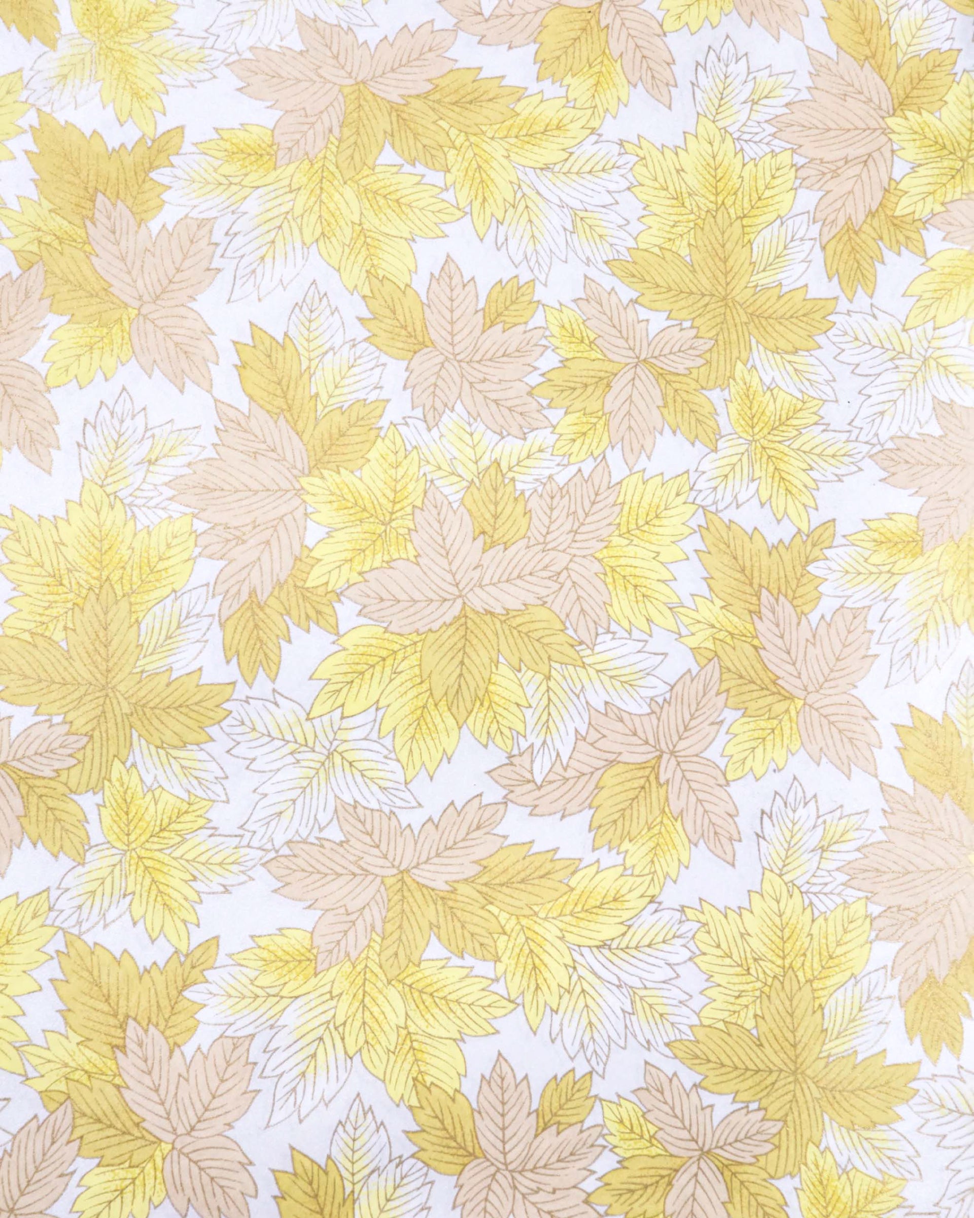 Japanese chiyogami paper featuring large yellow, beige, and white leaves on a pearlescent white background with metallic gold details.