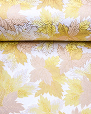 Japanese chiyogami paper featuring large yellow, beige, and white leaves on a pearlescent white background with metallic gold details.