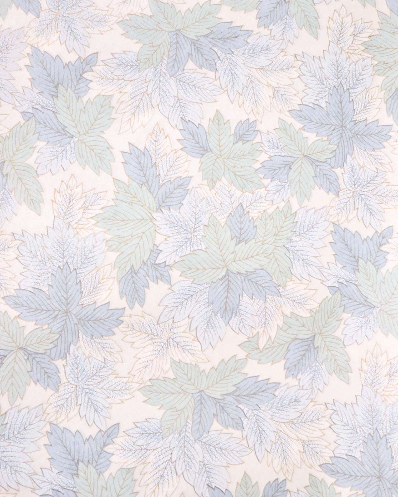 Japanese chiyogami paper featuring large blue, light mint green, and white leaves on a pearlescent white background with metallic gold details.