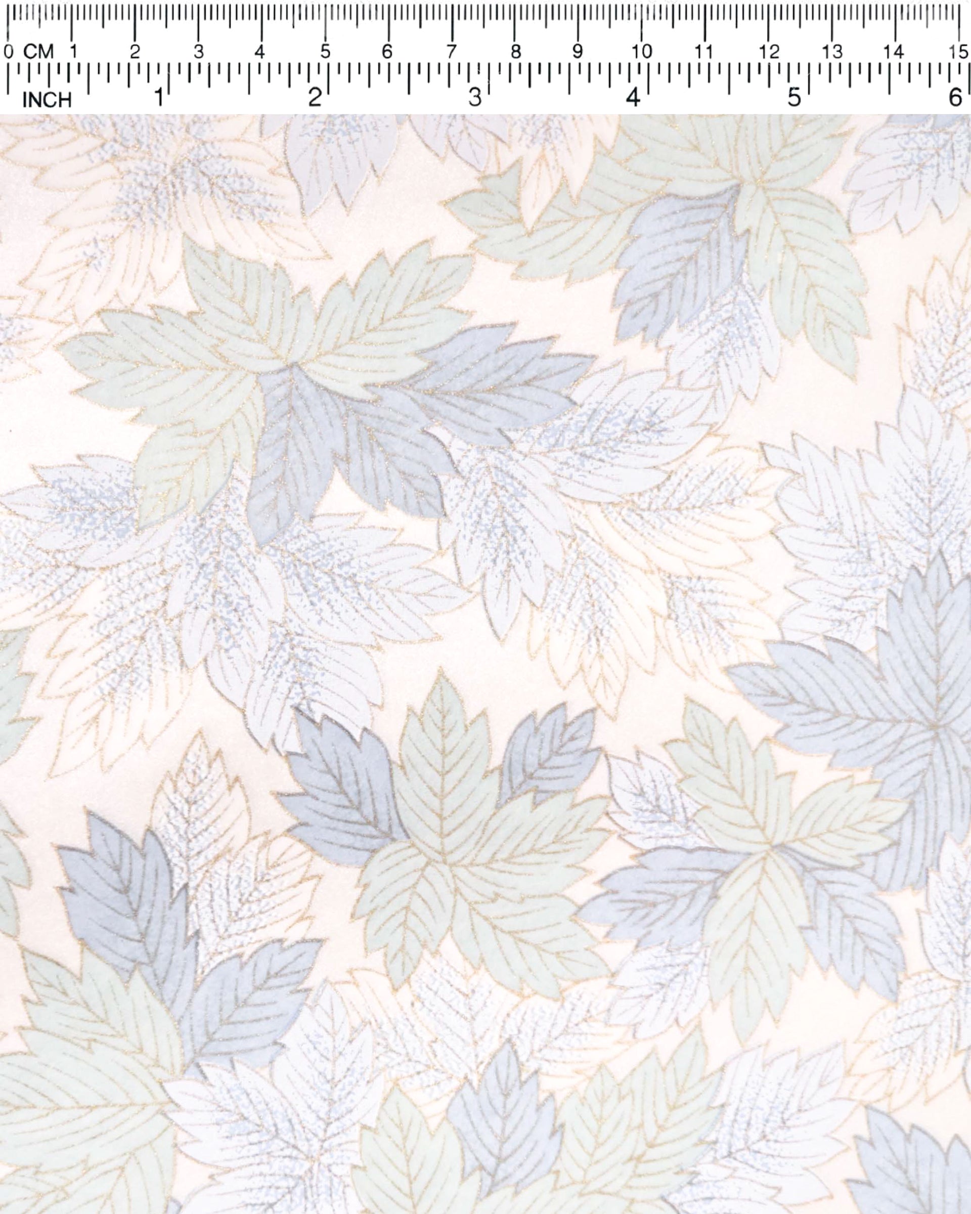Japanese chiyogami paper featuring large blue, light mint green, and white leaves on a pearlescent white background with metallic gold details.