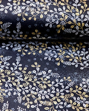 Japanese chiyogami paper featuring metallic gold and silver hagi (bush clover) on a black background.