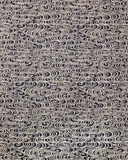 Japanese chiyogami paper featuring metallic gold water ripples on a black background.