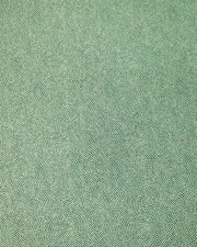 Japanese chiyogami paper featuring a very small metallic gold "same komon" (sharkskin) design on a dark green background.