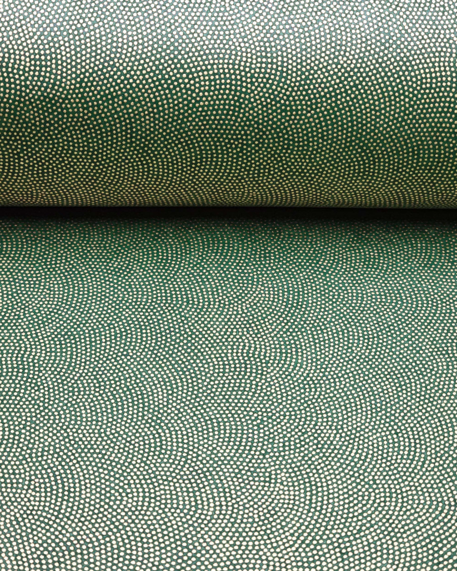 Japanese chiyogami paper featuring a very small metallic gold "same komon" (sharkskin) design on a dark green background.