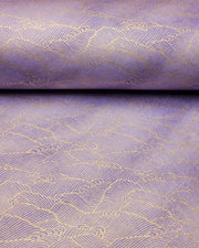 Japanese chiyogami paper featuring small metallic gold waves (aranami) on a gradient purple background.