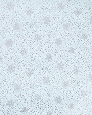 Japanese chiyogami paper featuring assorted metallic silver snowflakes and star constellations on a light blue background.