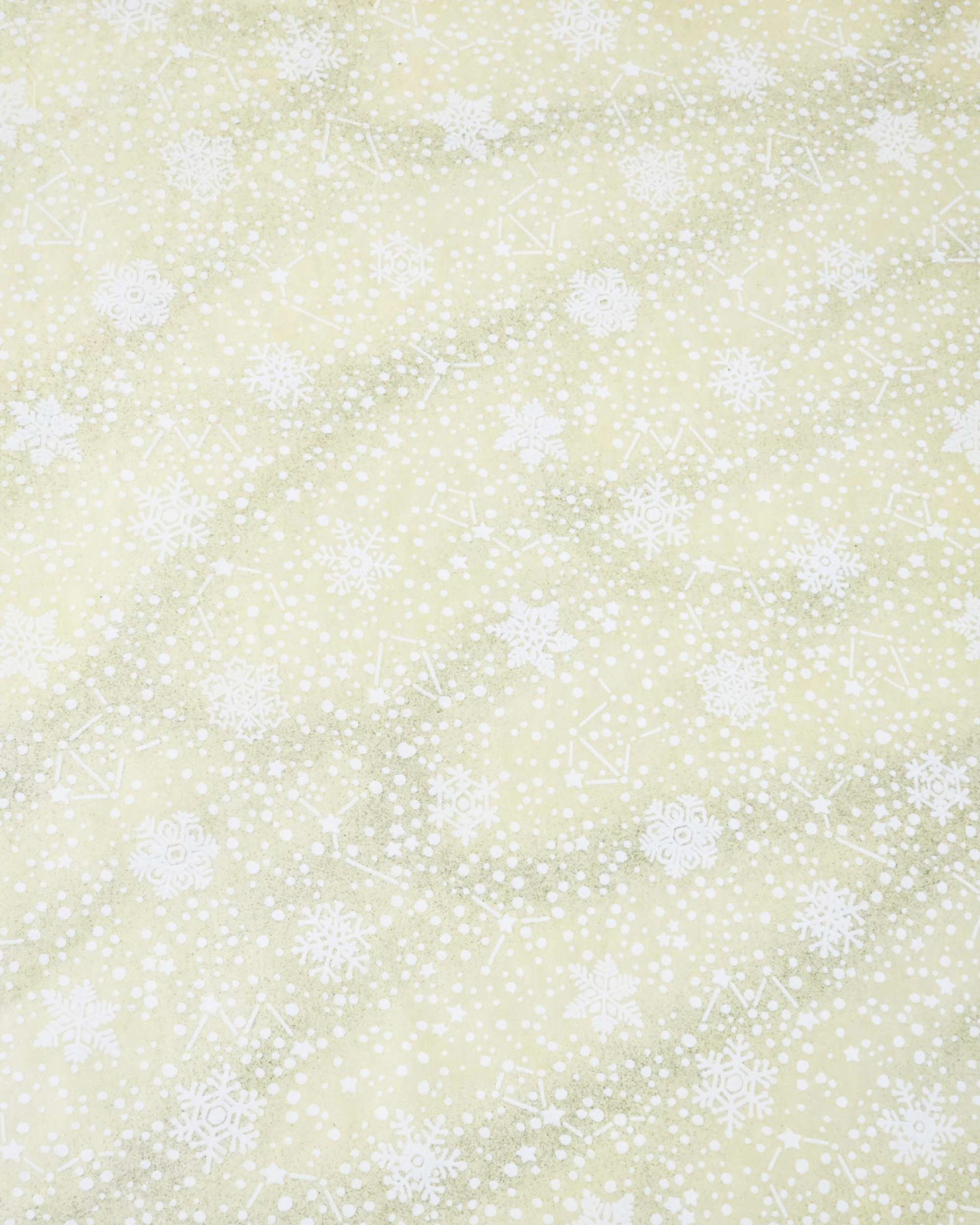 Japanese chiyogami paper featuring assorted white snowflakes and star constellations on a pearlescent light yellow background with metallic silver glitter details.