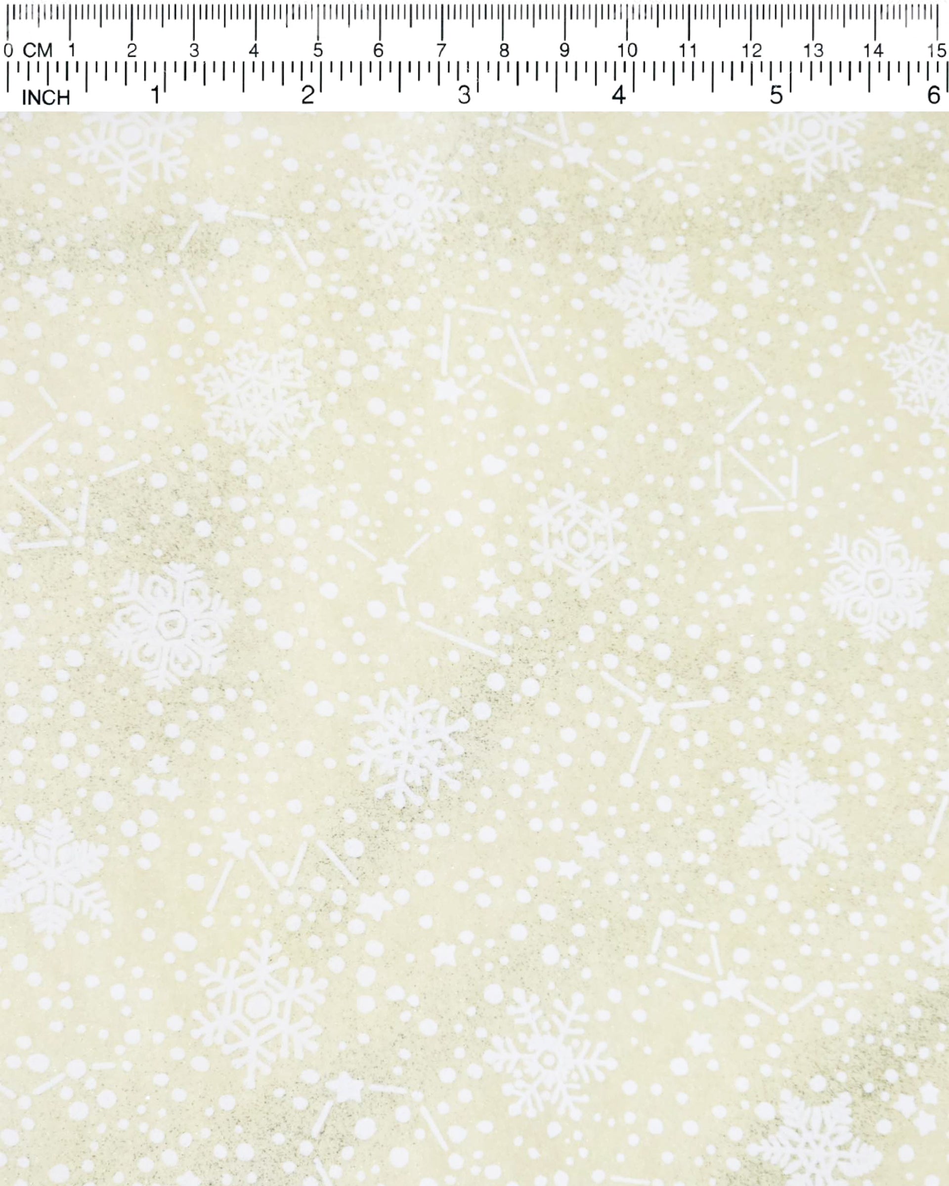 Japanese chiyogami paper featuring assorted white snowflakes and star constellations on a pearlescent light yellow background with metallic silver glitter details.