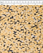 Japanese chiyogami paper featuring small gold and white momiji (maple leaves) on a black background with metallic gold details.