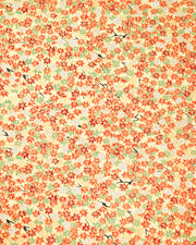Japanese chiyogami paper featuring small red, green, and white momiji (maple leaves) on a gold background with metallic gold details.
