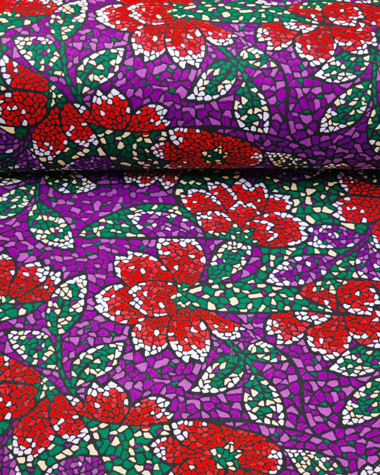 Japanese chiyogami paper featuring red and white flowers with green, cream, and white leaves on a dark purple background in a mosaic-inspired design.