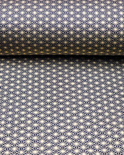 Japanese chiyogami paper featuring a small traditional gold asanoha (hemp leaf) pattern on a black background.