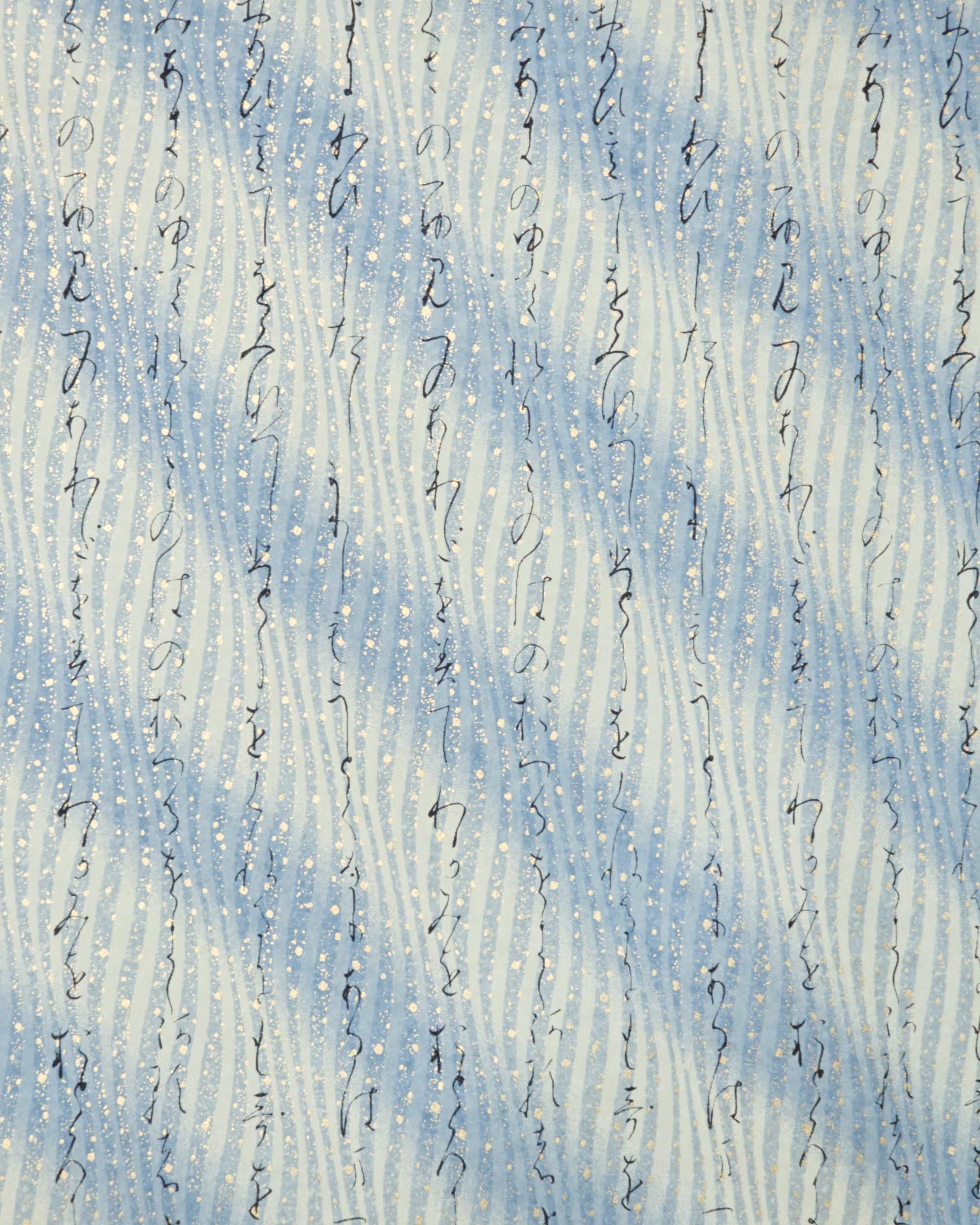 Japanese chiyogami paper featuring black Japanese calligraphy on a vertically swirling blue-gray and cream gradient background with metallic gold details.