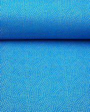 Japanese chiyogami paper featuring a metallic gold "same komon" (sharkskin) design on a blue background, shown rolled to highlight the design.