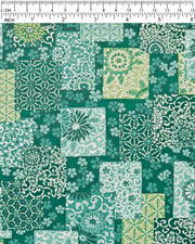 Japanese chiyogami paper featuring a patchwork-style arrangement of assorted floral and traditional Japanese patterns in various shades of green and white, shown next to a ruler for size reference.

