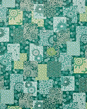 Japanese chiyogami paper featuring a patchwork-style arrangement of assorted floral and traditional Japanese patterns in various shades of green and white. 