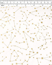 Japanese chiyogami paper featuring metallic gold stars and constellations scattered across a white background with shimmering metallic silver stardust, shown next to a ruler for size reference.
