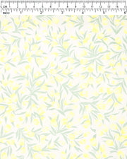 Japanese chiyogami paper featuring pale yellow and white tulips with light green leaves on a white background, shown next to a ruler for size reference.