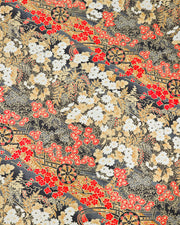 Japanese chiyogami paper featuring black flower carts with assorted red, white, and gray flowers with brown leaves on a gray background with metallic gold details. 