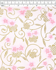 Japanese chiyogami paper featuring pink cherry blossoms alongside gold cherry blossoms and leaves decorated with a traditional kanoko (fawn) pattern on a light pink background, shown next to a ruler for size reference.