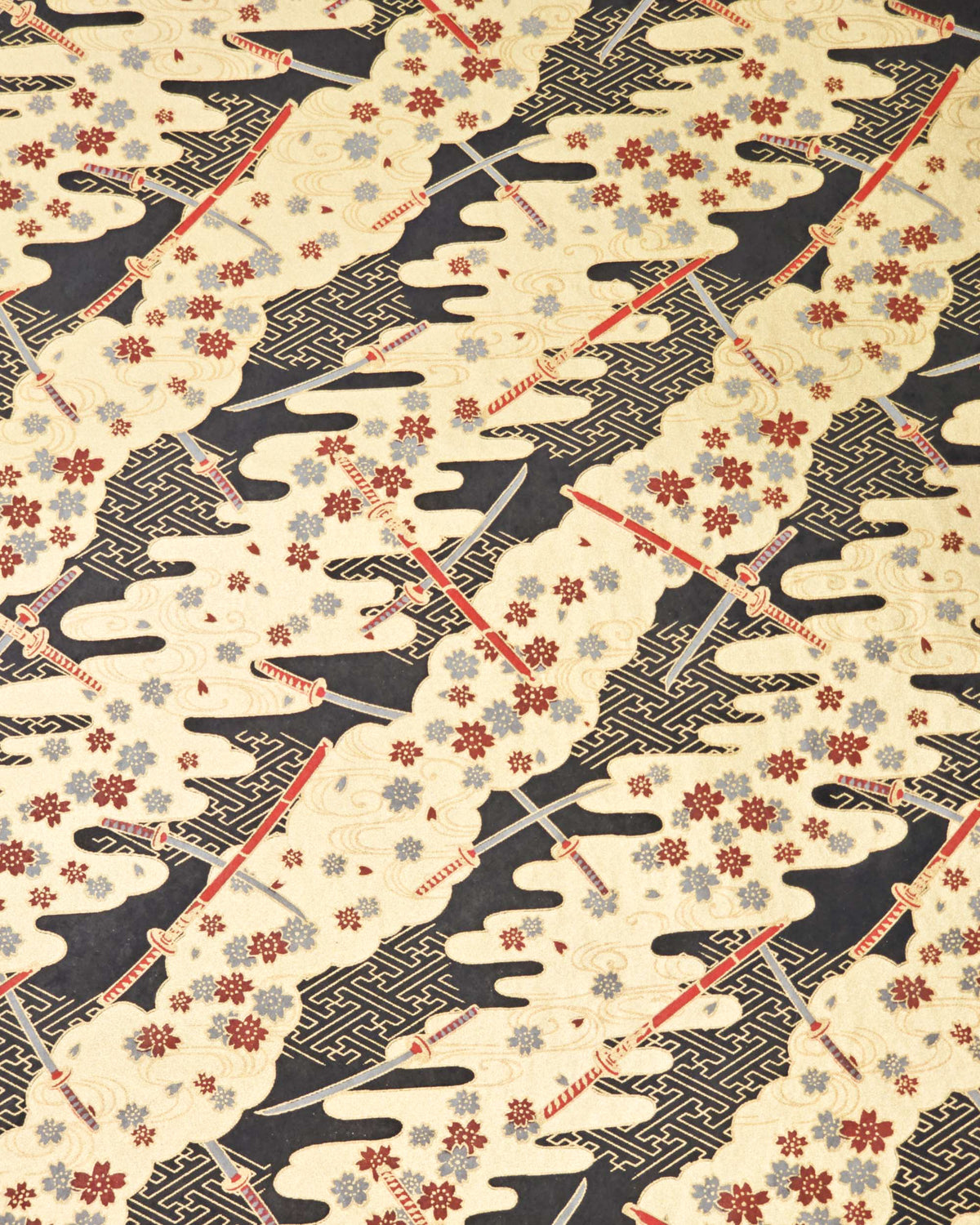 Japanese chiyogami paper featuring red and gray katana swords with gray and maroon red cherry blossoms on a black and gold background with metallic gold details. 