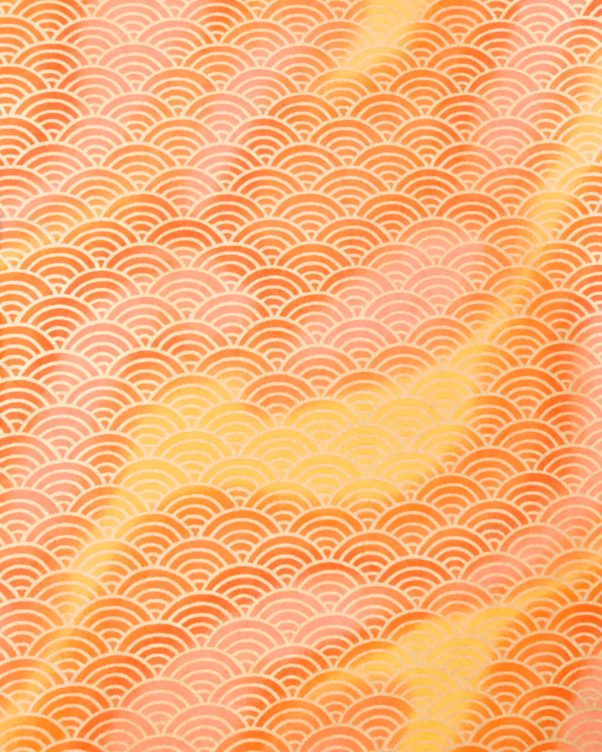 Japanese chiyogami paper featuring a large metallic gold traditional seigaiha (wave crest) pattern on a flowing background in various shades of orange. 