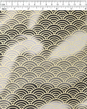 Japanese chiyogami paper featuring a large metallic gold traditional seigaiha (wave crest) pattern on a flowing background in various shades of gray and black, shown next to a ruler for size reference.