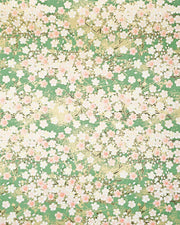 Japanese chiyogami paper featuring light pink and white cherry blossoms on a green background with metallic gold details.