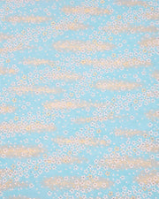 Japanese chiyogami paper featuring small white and gold cherry blossoms on an aqua blue background with metallic gold details.