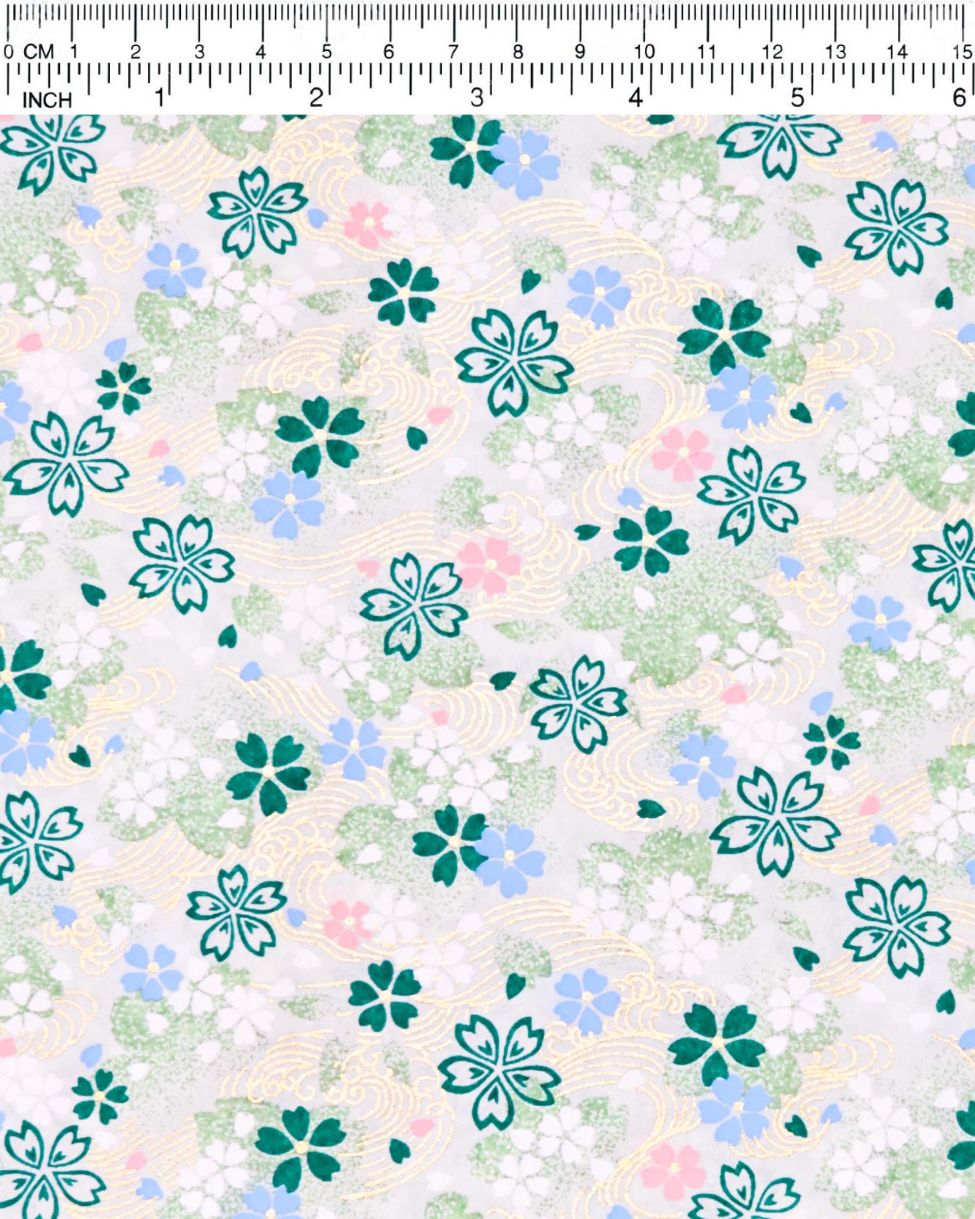 Japanese chiyogami paper featuring green, white, blue, and pink cherry blossoms on a green background with metallic gold details.