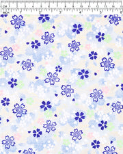 Japanese chiyogami paper featuring blue, white, green, and pink cherry blossoms on a light blue background with metallic gold details.