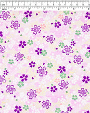 Japanese chiyogami paper featuring purple, white, green, and pink cherry blossoms on a purple background with metallic gold details.