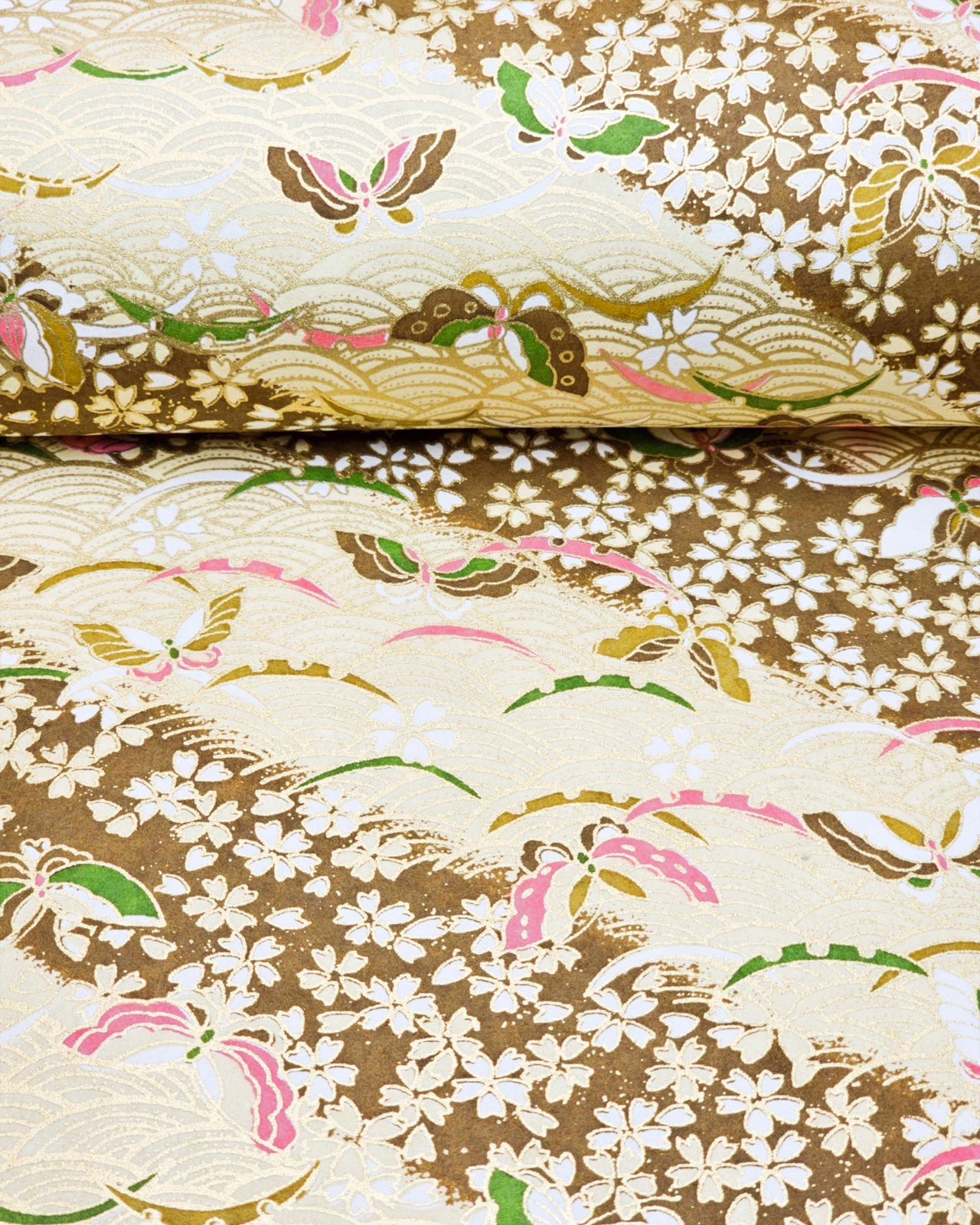 Japanese chiyogami paper featuring brown, pink, and green butterflies and small brown cherry blossoms on a brown seigaiha (wave crest) background with metallic gold details.