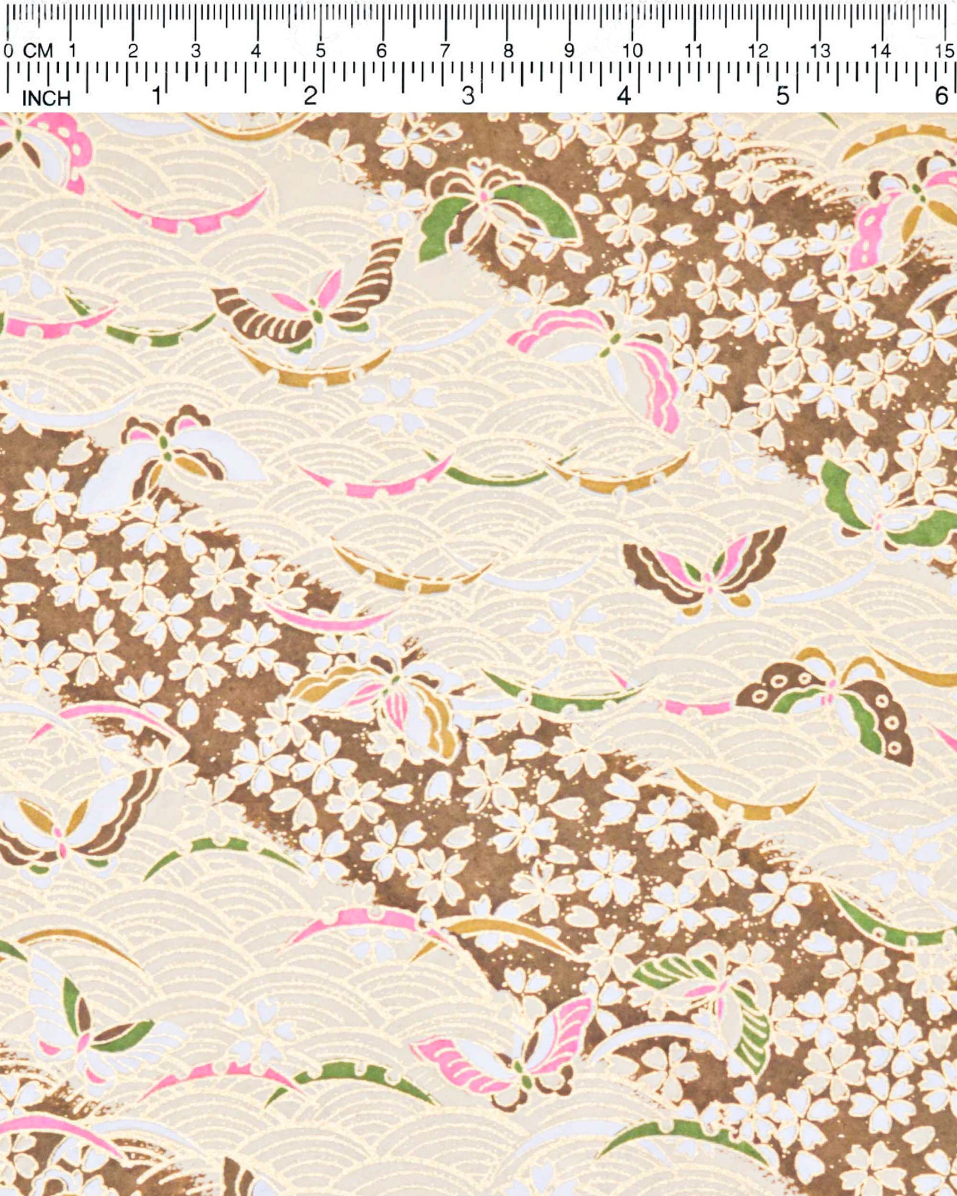 Japanese chiyogami paper featuring brown, pink, and green butterflies and small brown cherry blossoms on a brown seigaiha (wave crest) background with metallic gold details.