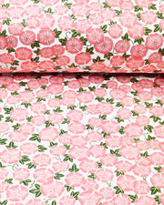 Japanese chiyogami paper featuring pink morning glory flowers with green leaves on a white background with metallic gold details.