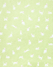 Japanese chiyogami paper featuring assorted white cats with red collars on a light green asanoha (hemp leaf) background.