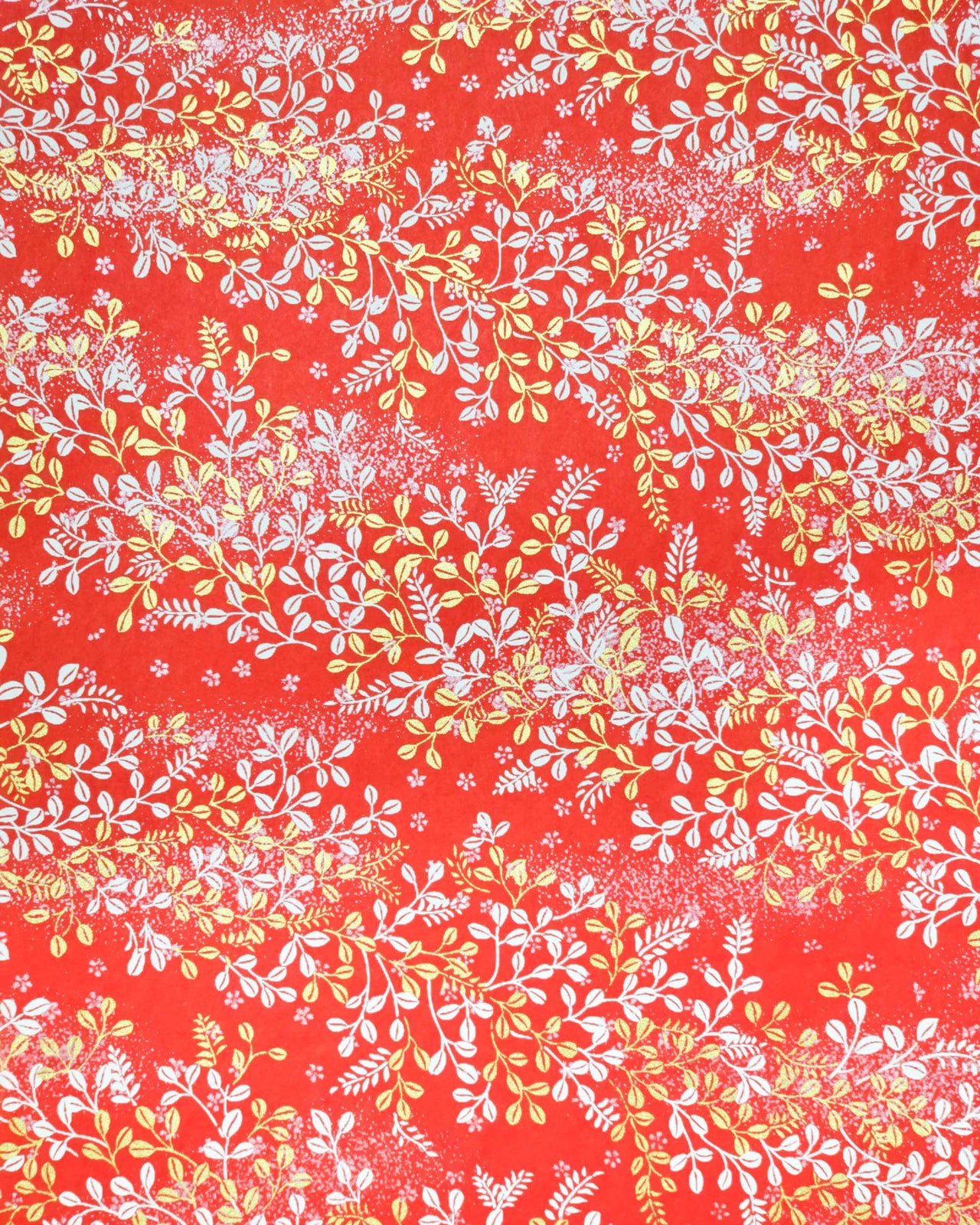 Japanese chiyogami paper featuring metallic gold and white hagi (bush clover) on a red background.