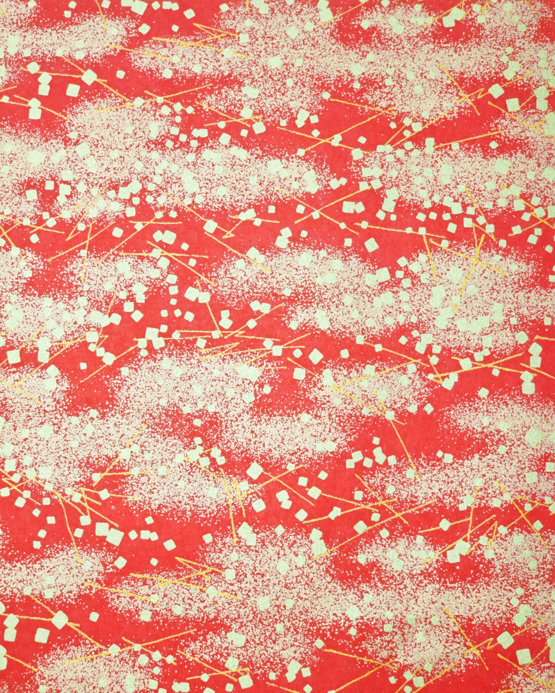 Japanese chiyogami paper featuring scattered metallic gold geometric shapes and fine gold lines on a red background.