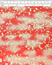 Japanese chiyogami paper featuring scattered metallic gold geometric shapes and fine gold lines on a red background.