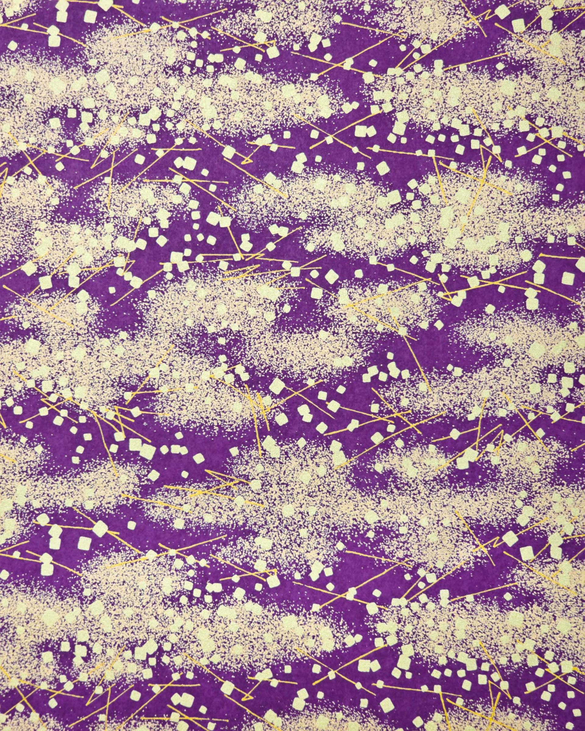 Japanese chiyogami paper featuring scattered metallic gold geometric shapes and fine gold lines on a dark purple background.