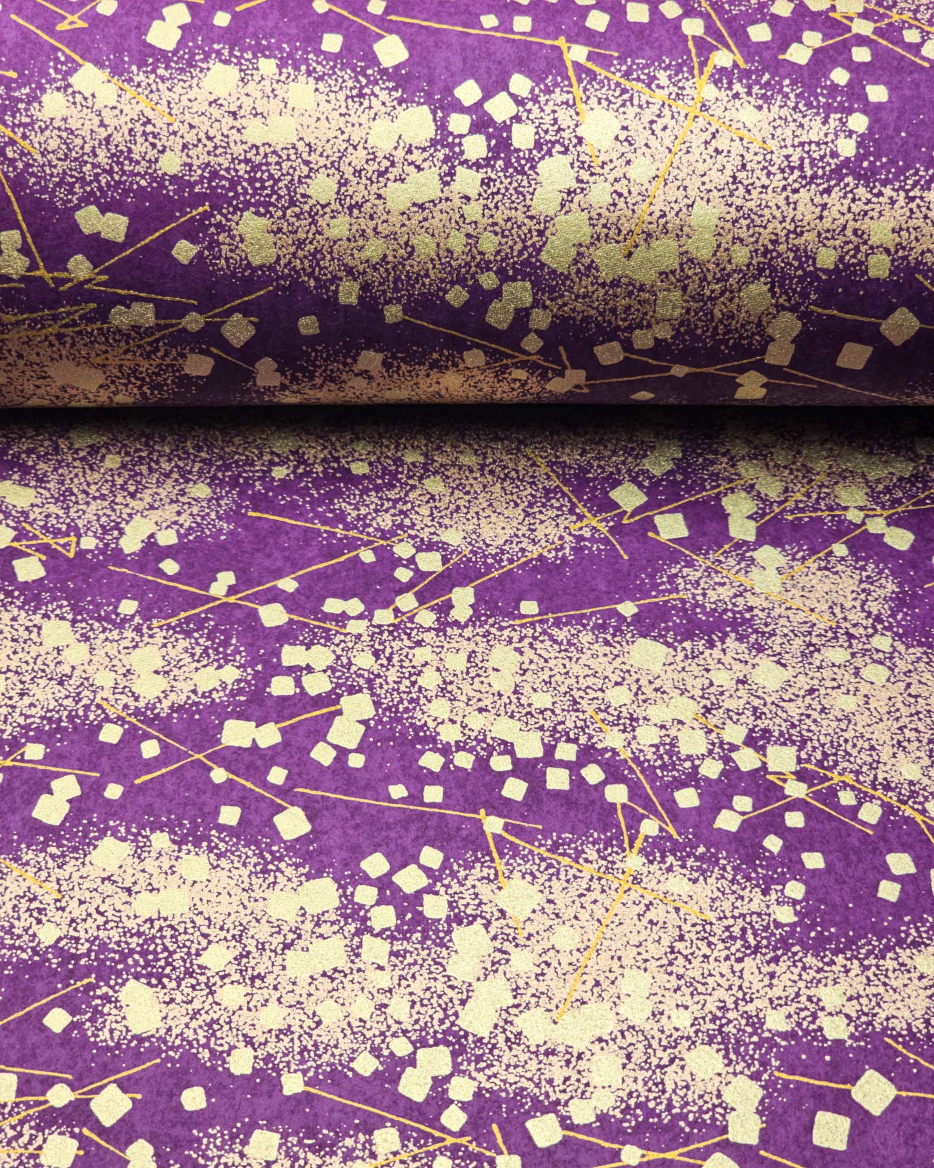 Japanese chiyogami paper featuring scattered metallic gold geometric shapes and fine gold lines on a dark purple background.