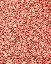 Japanese chiyogami paper featuring a metallic gold floral motif on a bright red background.