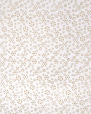 Japanese chiyogami paper featuring metallic gold snowflakes of various sizes on a white background.