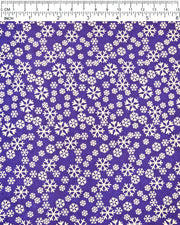 Japanese chiyogami paper featuring metallic gold snowflakes of various sizes on a dark blue background.